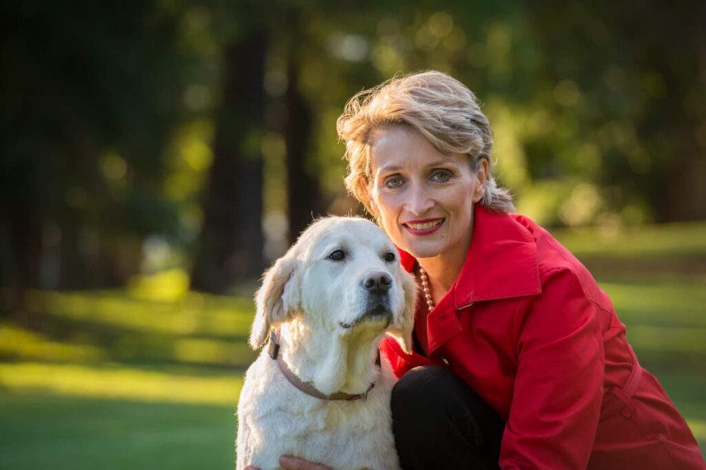 Clare and Minka red coat